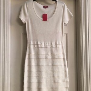 Never worn dresses. Tags still on. Form fitting.